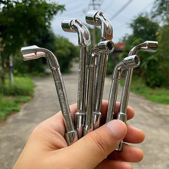 Clé à pipe ergonomique
